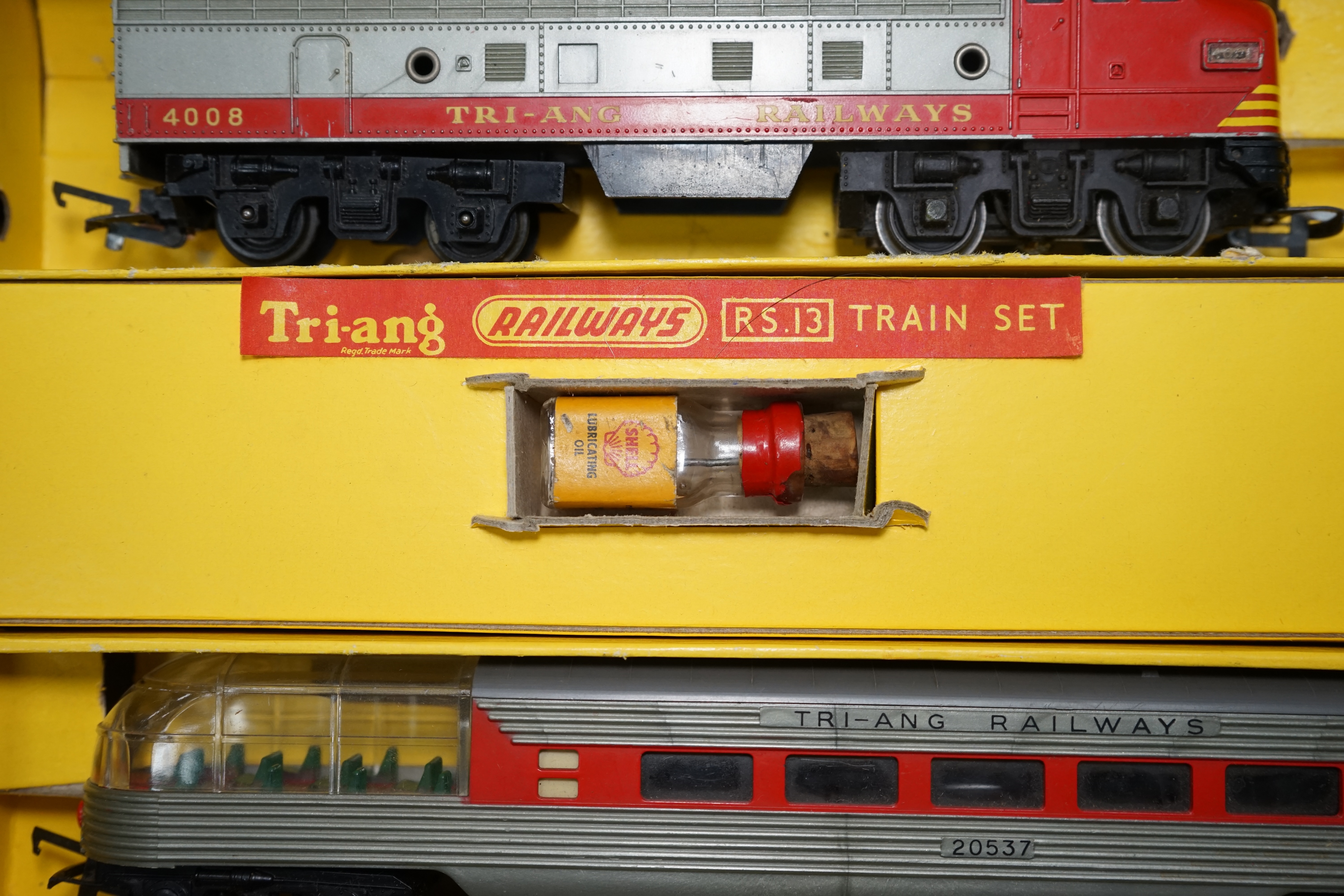 A collection of Hornby Dublo and Tri-ang Railways 00 gauge railway contained within two original boxes; a Hornby Dublo EDG17 Tank Goods Train B.R. set, contents include a BR Standard Class 4, 80054, fourteen tinplate fre